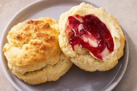 Easy Drop Biscuits with Buttermilk Biscuit Flour on a plate with jam and butter - select to zoom