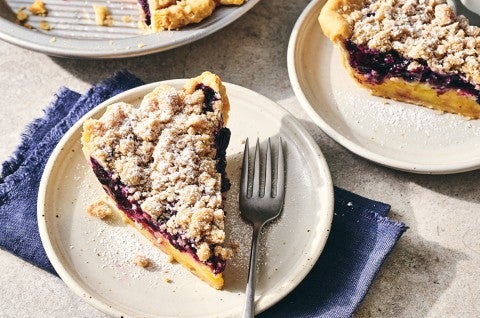 A slice of Lemon-Blueberry Streusel Pie on a plate - select to zoom