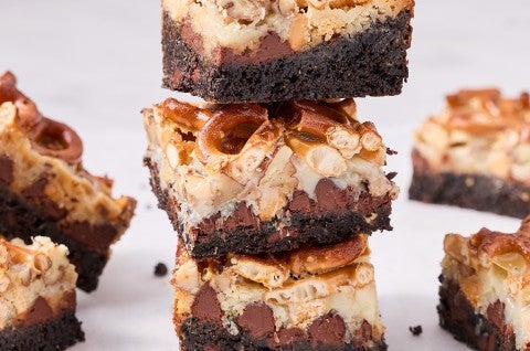 A stack of three gluten free seven chocolate layer bars. - select to zoom