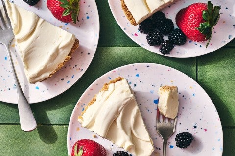 Slices of Easy Ice Cream Pie on plates with fresh berries - select to zoom