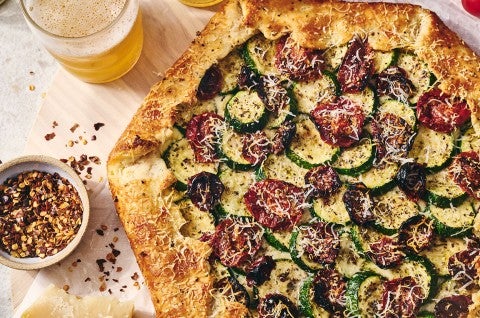 Savory Zucchini Galette on a counter seen from above - select to zoom