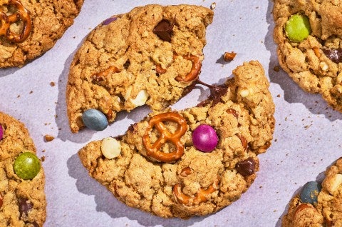 A broken Monster Cookie showing the crunchy bake - select to zoom