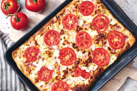 BLT Pizza fresh out of the oven in a sheet tray - select to zoom