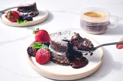 Scooping a bite from a Flourless Chocolate Lava Cake - select to zoom