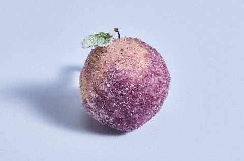 A single Sugar Plum Cookie on a blue backdrop - select to zoom