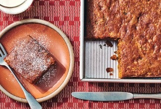 Spicy Cake Pan Cake in a King Arthur Baking square baking pan and a slice on a plate.