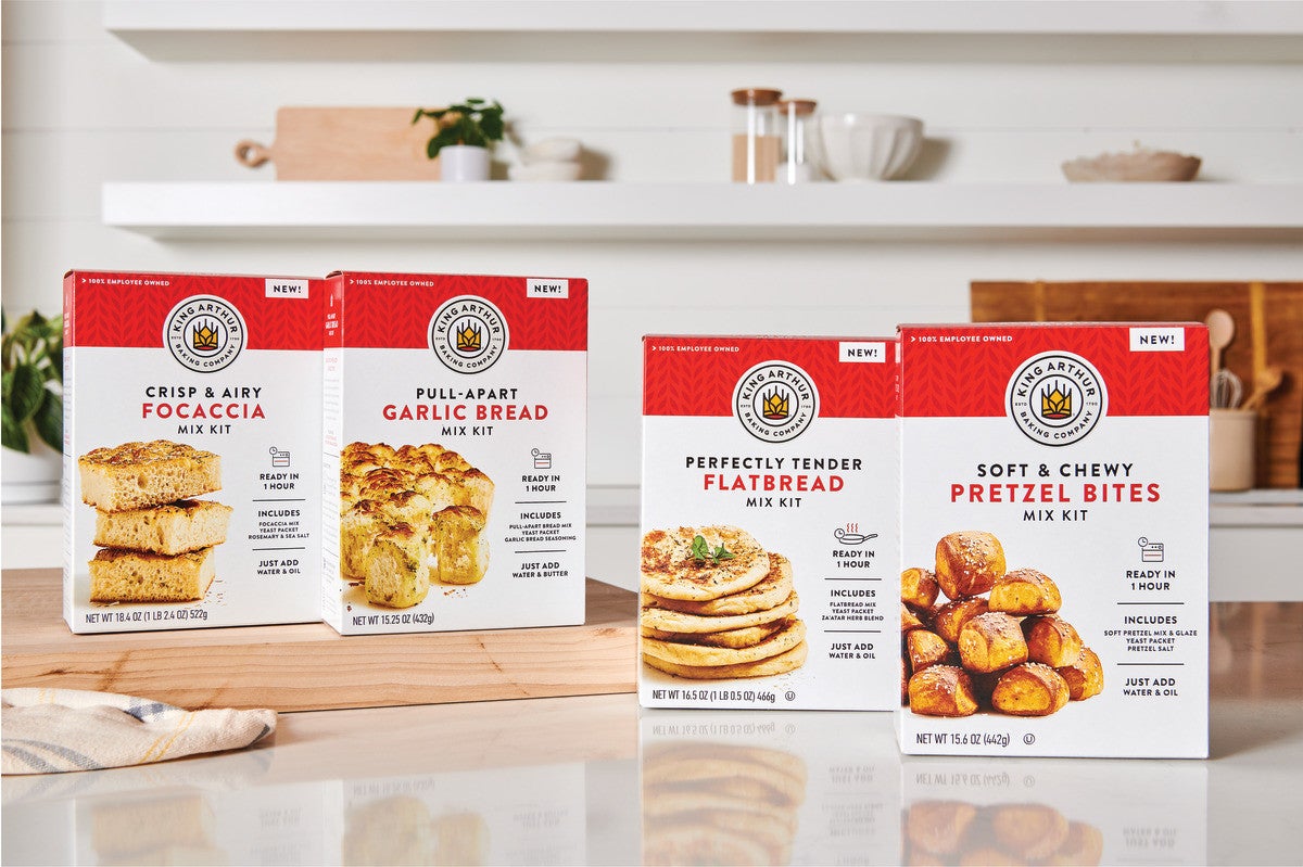 Four King Arthur Bread Mix Kits on a kitchen table