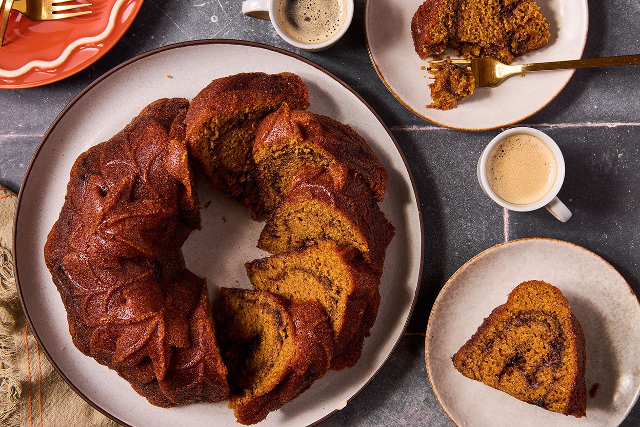 Pumpkin Espresso Bundt Cake shown in the shape of the bundt can but sliced