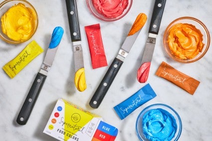 Different brightly colored frostings made with Supernatural food coloring 