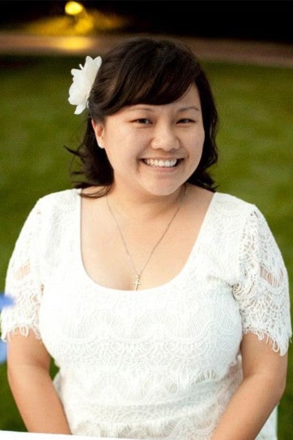 A headshot of Joy Huang