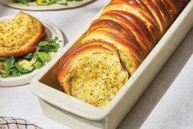Butterflake Herb Loaf in a pan showing the buttery and herbaceous interior
