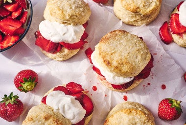 Strawberry Shortcake seen from above on a table cloth