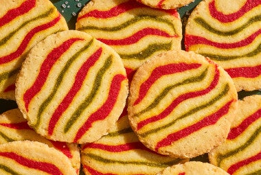 Ribboned Peppermint Shortbread Cookies stacked and arranged seen from above